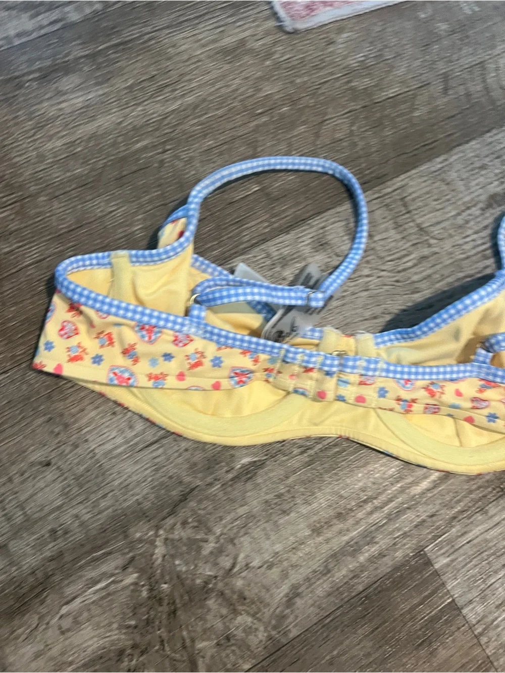 Frankie’s bikinis vs pink buttercup bikini top in yellow and blue